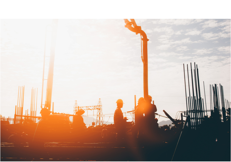 Silhouette construction industry team safely to work load concrete building according to set goal over blurred background sunset pastel for industry background.