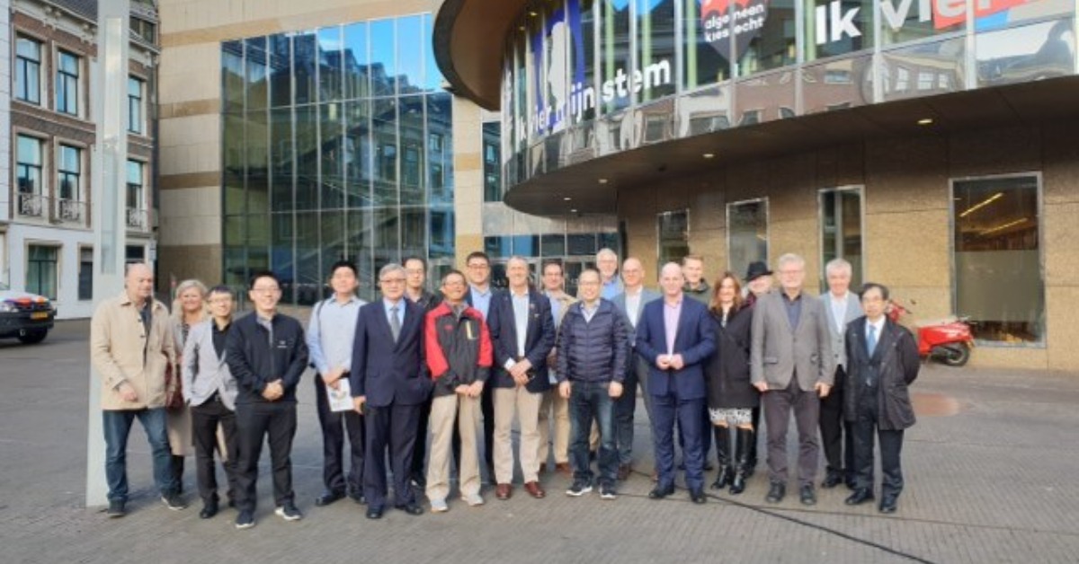 Neil Savery with international delegates overseas